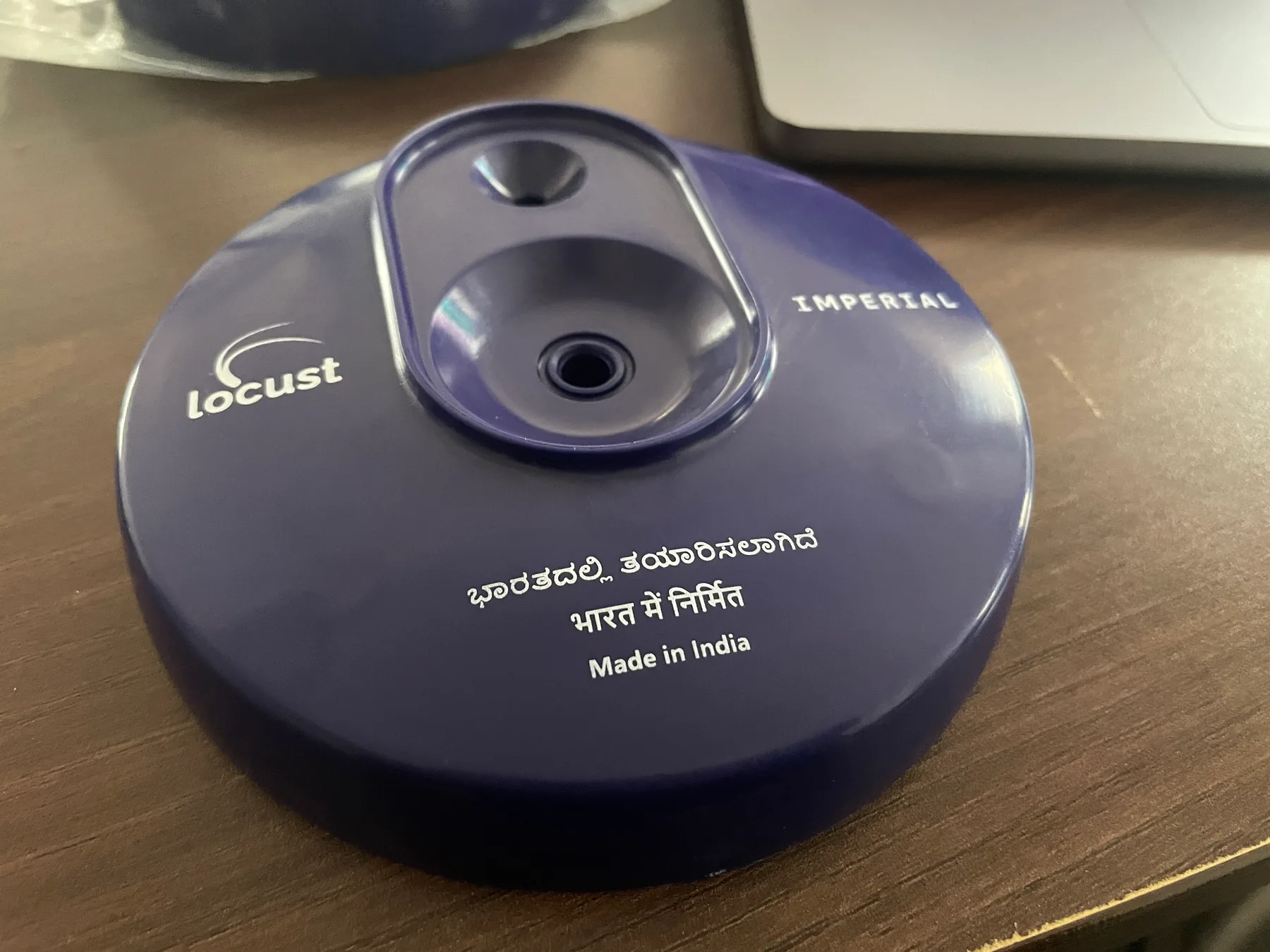 Purple Locust Imperial plastic part marked Made in India, with Kannada and Hindi text.